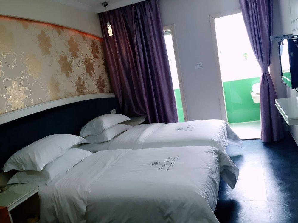 Xinghe Xinfeng Hotel Kanton Zewnętrze zdjęcie