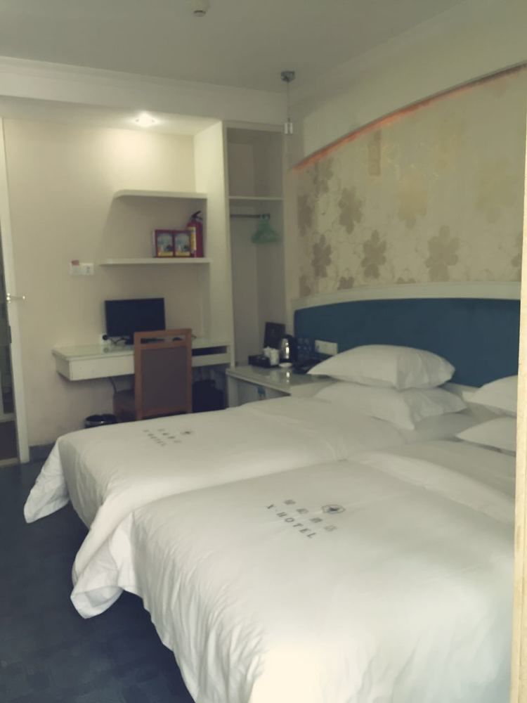 Xinghe Xinfeng Hotel Kanton Zewnętrze zdjęcie