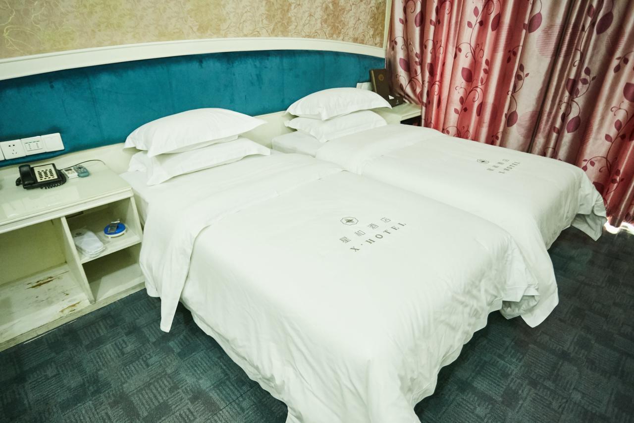 Xinghe Xinfeng Hotel Kanton Zewnętrze zdjęcie